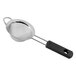 An OXO stainless steel strainer with a black handle.