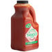 A white gallon bottle of TABASCO Sriracha Hot Sauce.