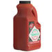 A large plastic jug of red TABASCO® Scorpion Hot Sauce.