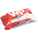 A red and white package of WipesPlus food contact surface sanitizing wipes.