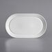 A white rectangular porcelain platter with a wide rim and embossed lines.
