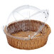 A wicker basket with a clear plastic cover.