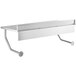 A white metal Regency wall mounted table with a long rectangular shelf above it.