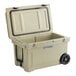 A tan CaterGator outdoor cooler with wheels on the side.