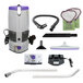 A white ProTeam cordless backpack vacuum with various parts.