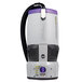 A white box with purple and grey accents containing a ProTeam cordless backpack vacuum.