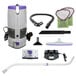 A white ProTeam cordless backpack vacuum with various parts including an Xover multi-surface telescoping wand.