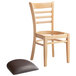 A Lancaster Table & Seating natural finish wood ladder back chair with a dark brown vinyl seat on a white background.