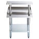 A Regency stainless steel equipment stand with stainless steel and galvanized shelves.