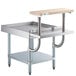 A Regency stainless steel equipment stand with a wooden top shelf.