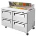 A Turbo Air stainless steel refrigerated sandwich prep table with 4 drawers.