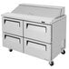 A stainless steel Turbo Air refrigerated sandwich prep table with four drawers.