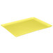 A yellow rectangular MFG fiberglass dietary tray.