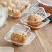 A Baker's Mark 1-compartment clear plastic container holding a muffin.
