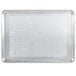 A silver Vollrath Wear-Ever aluminum sheet pan with holes in it.