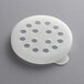 A white plastic lid with holes.