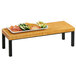 A Cal-Mil Madera rustic pine wood rectangle riser with vegetables on it.
