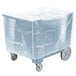 A Cambro slate blue plastic covered dish cart on wheels.
