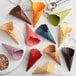 A group of Konery waffle cones in various colors.