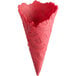 A pink waffle ice cream cone with a red patterned design.
