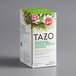 A white Tazo tea box with a pink flower design.