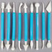 A blue rectangular Ateco sculpting set box with white writing on it.
