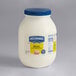 A white container of Hellmann's Real Mayonnaise with a blue lid.