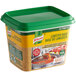 A green container of Knorr Ultimate Lobster Bouillon Base on a table.