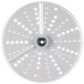 A white circular Robot Coupe hard cheese grating disc with holes in it.