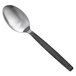 An American Metalcraft stainless steel spoon with a wavy handle.