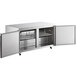 An Avantco stainless steel undercounter refrigerator with two doors open.