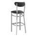 A Lancaster Table & Seating black vinyl bar stool with chrome legs and a clear coat finish.
