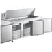 An Avantco stainless steel commercial kitchen with two open doors.