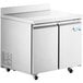 An Avantco stainless steel worktop freezer with two doors on a white background.