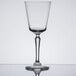 A Libbey cocktail glass with a long stem on a white background.