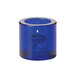 A Hollowick cobalt blue glass tealight candle holder with a lit candle inside.