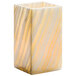 A rectangular white alabaster candle holder with a yellow and grey striped pattern.