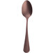 A Sola stainless steel teaspoon with a copper handle.