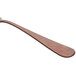 A Sola vintage copper stainless steel dessert fork with a wooden handle.
