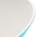 A white melamine bowl with a blue Seabreeze design and white rim.