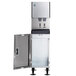 A stainless steel Hoshizaki ice maker and water dispenser with a door open.