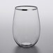 A Visions clear plastic wine glass with silver rim.