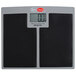 A Cardinal Detecto SlimTALKXL low-profile digital scale with a grey display.