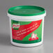 A white container of Knorr Tomato Bouillon with Chicken Flavor with a green lid.