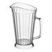 A Carlisle clear polycarbonate beverage pitcher with a handle.