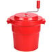 A red plastic Chef Master salad spinner with a handle.