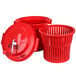 A red plastic bucket with a lid and a handle.