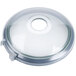 A white round glass lid with a seal and a hole in the center.