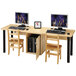 A Jonti-Craft dual children's wood computer lab table with lockable dual CPU cabinet with two computer monitors on it.