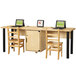 A Jonti-Craft wooden lab table with two laptops on it and a lockable cabinet.